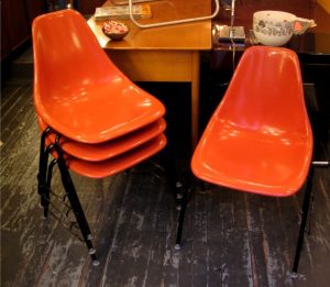 Set of Four Stacking Orange Shell Chairs