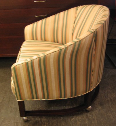 Pair of Low Barrel Back Club Chairs on Wheels