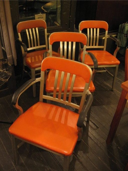 Set of Four Goodform Arm Chairs in Orange