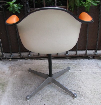 Set of Four Eames Orange Upholstered Arm Shell Swivel Chairs